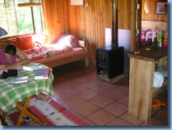 Livingroom view of cabin at Antilco, the horse riding ranch in Chile